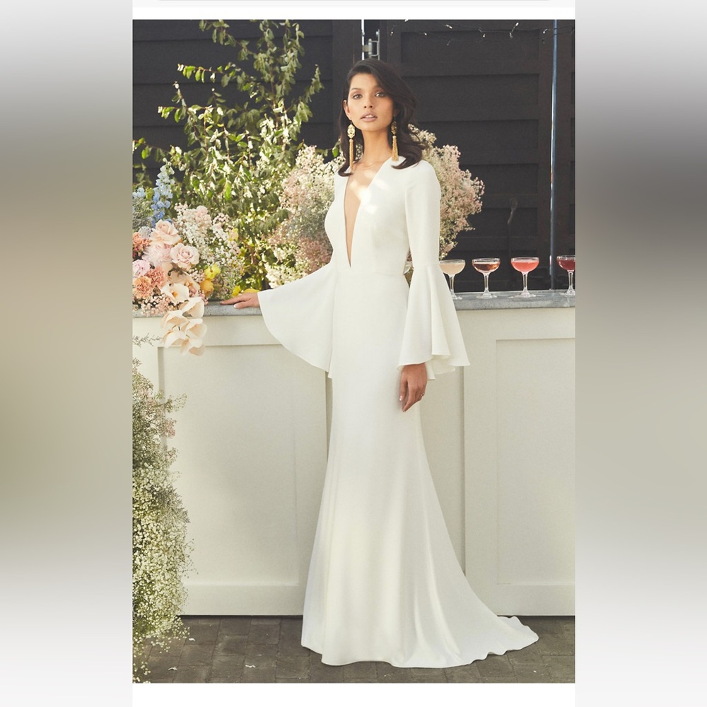 Elegant White Gown with Flared Sleeves